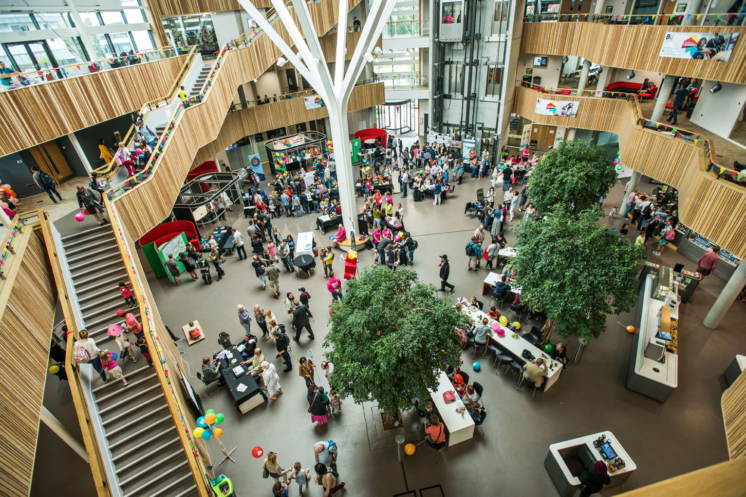 Crowds of people inside the Fusion Building during the Festival of Learning