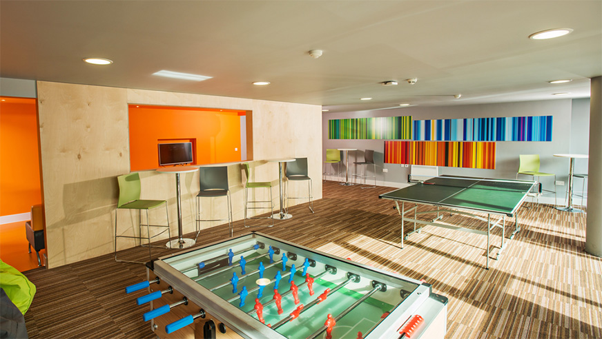 One of the College's light-filled social spaces, containing table football and table tennis