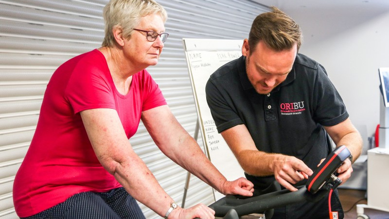 BU's Tom Wainwright - who is a member of our Orthopaedic Research Institute - with a patient on an exercise bike