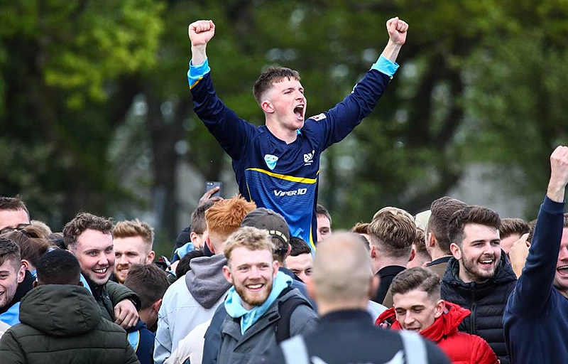Image of a man celebrating at a football match Celebration at a football match