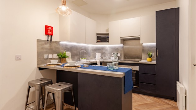 A shared kitchen in area in Belaton House