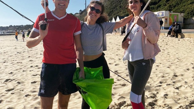 Image of students on Bournemouth Beach about to do a beach clean