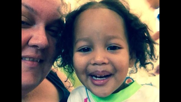 Michelle with a little girl