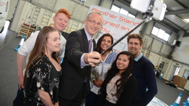 Vice Chancellor John Vinney takes a selfie with BU Graduates and Placement students 