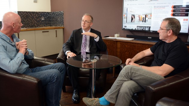 Vice Chancellor Prof. John Vinney talks with Andrew Carney and Alan Jenkins, of Quadrant2Design