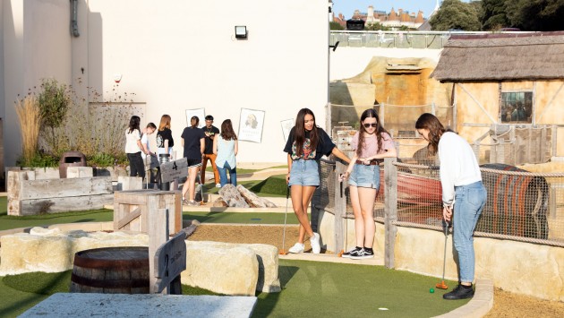 Image of students playing mini-golf in Bournemouth