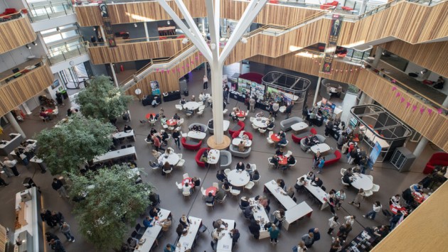 The view from the top of The Fusion Building - the hub of Open Day activities. The building is a modern, light-filled space with wood cladding and at the heart of campus activities. 