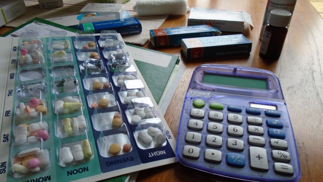 A calculator and pills