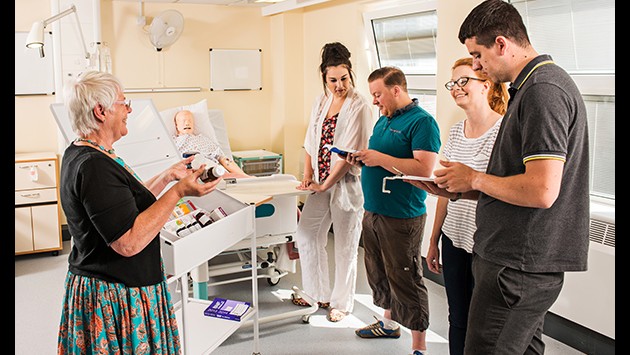 Mental health nursing students in a practical session on the ward