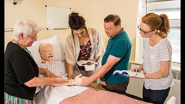 Mental health nursing students in a practical session on the ward