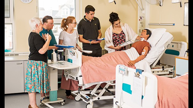 Mental health nursing students in a practical session on the ward