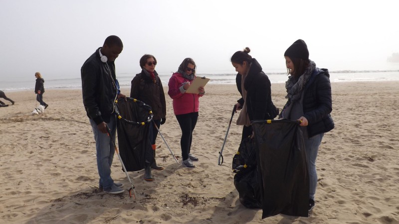Students taking part in a beach clean