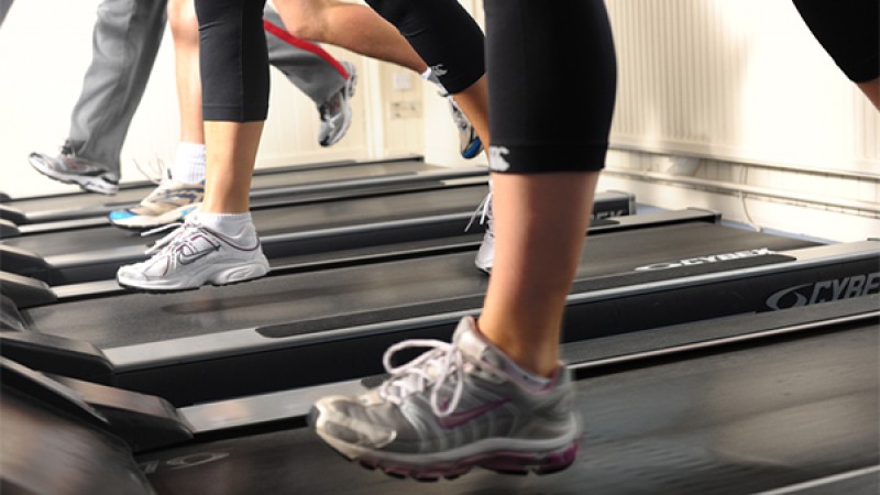 Images of people feet running on a treadmill