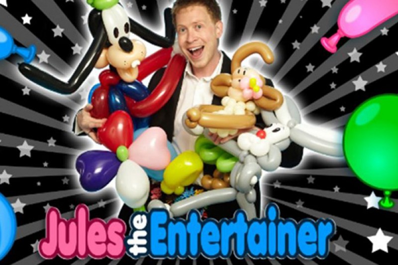 An image of Jules the Entertainer with show props