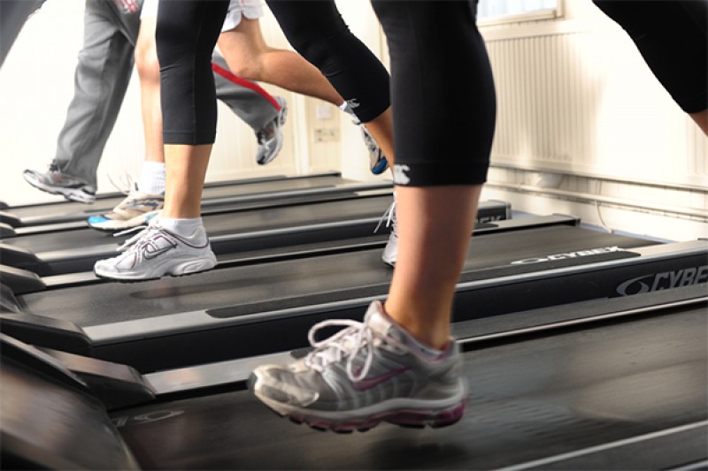 Images of people feet running on a treadmill