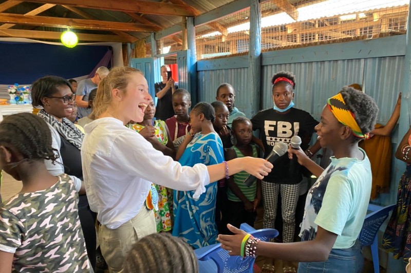 Ruth Harley, BU graduate, working with a group of girls in Kenya
