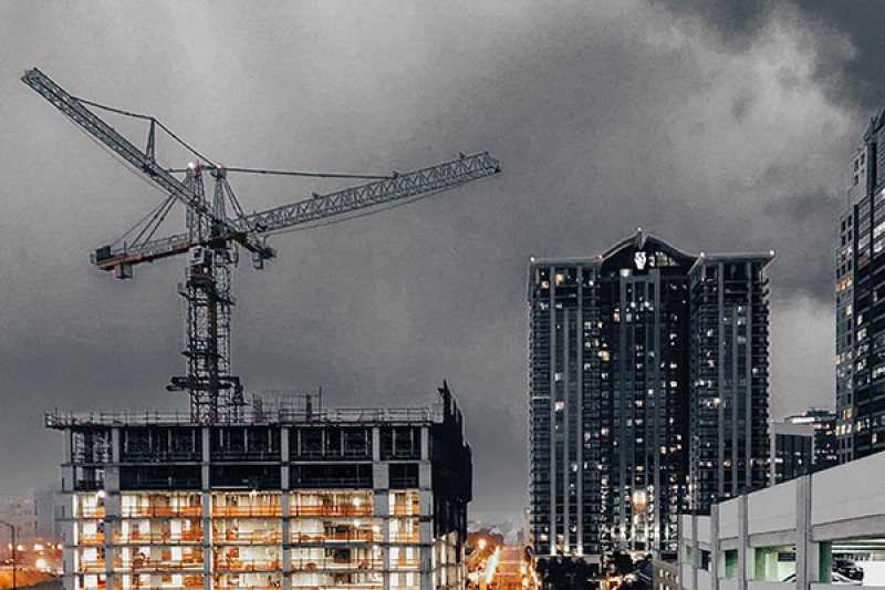A crane over a building under construction