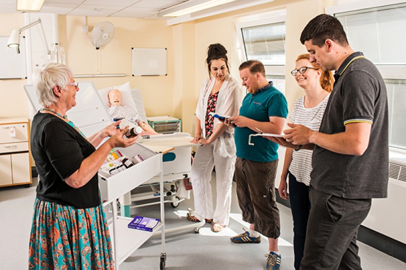 Mental health nursing students in a practical session on the ward