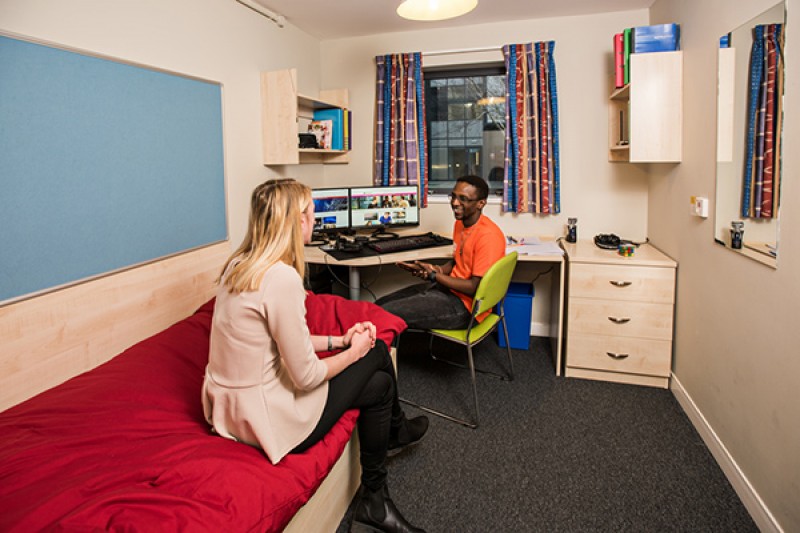 Two BU students in a hall of residence room