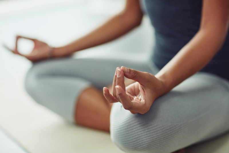 A woman pulling a yoga pose