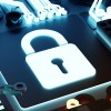 A padlock on a computer chip 
