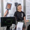 Eleanor Webb showcasing her engineering product at The Festival of Design & Engineering (FODE)