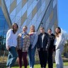 Events Management students outside Poole Gateway Building on Talbot Campus