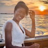 Nicola Matiwone on a yacht at sunset