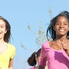 Children Happily Running Through the Park