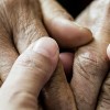 Holding elderly hands