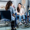 Image of a student nurse and a young women in a wheelchair