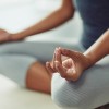 A woman pulling a yoga pose