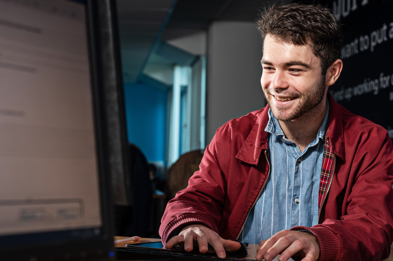 Student sitting at a computer