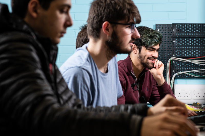 students in cyber security lab students in cyber security lab