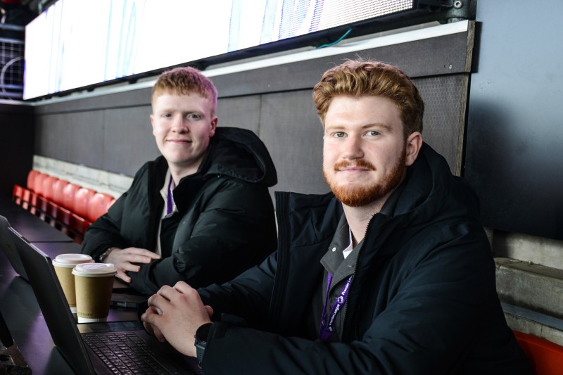 Jack Hillman (L) and Finn Payne (R) reporting on an AFC Bournemouth match