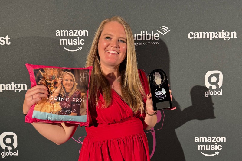 Graduate Becca Poutney with her award