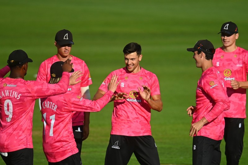 Brad Currie with his Sussex team mates 