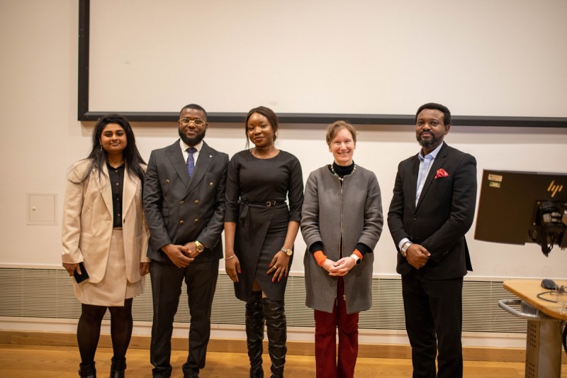 CMLR Three women and two men standing side by side looking at the camera