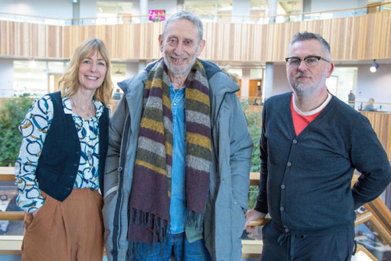 Charity founders Dee Hughes and Emma Scattergood standing either side of Michael Rosen