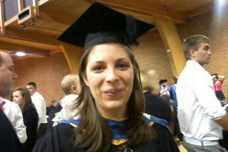 A selfie shot of Edda in her graduation cap. 