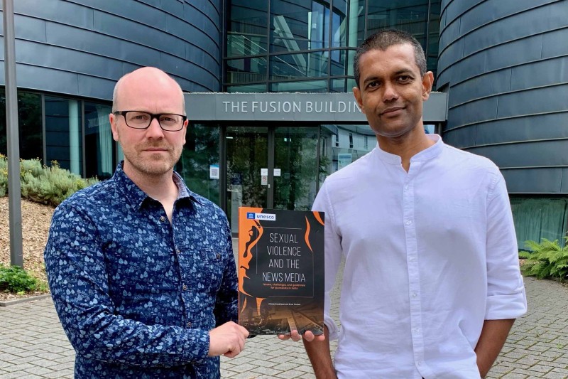 A photo of Einar and Chindhu outside the Fusion Building