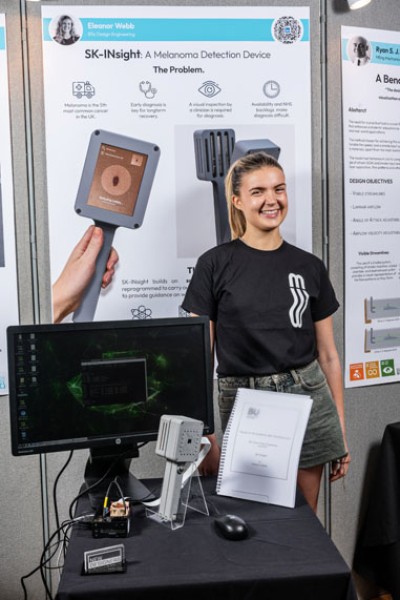 Eleanor Webb showcasing her engineering product at The Festival of Design & Engineering (FODE)