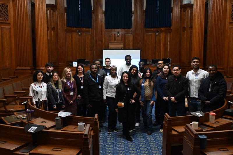 A group of students standing in the BCP town hall