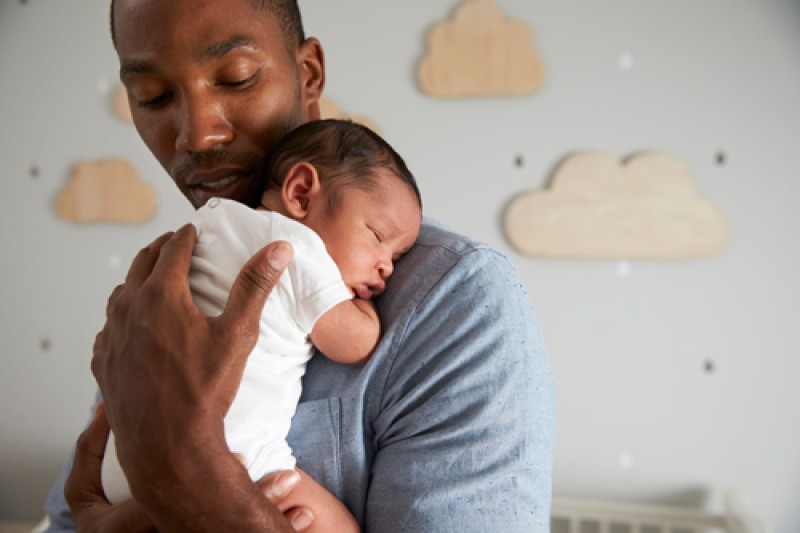 New Father Holding Baby