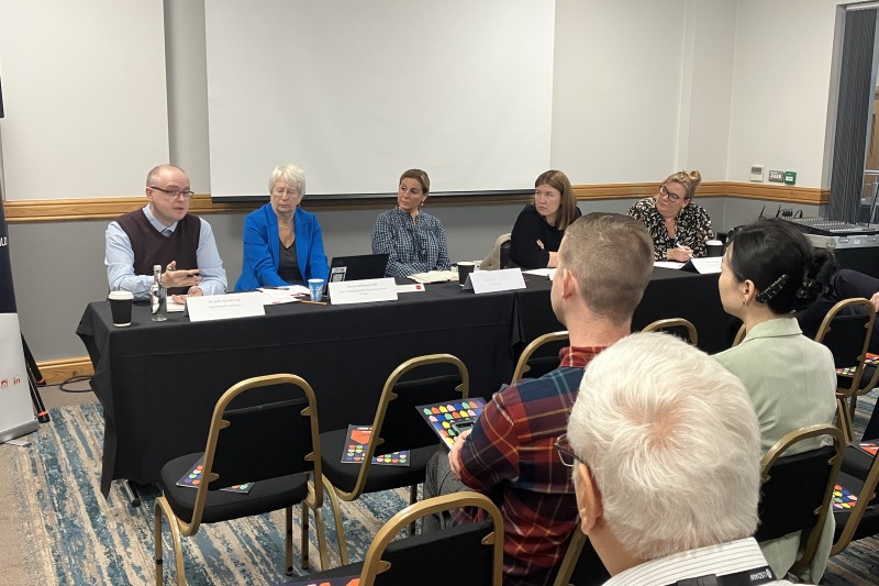 Dr John McAlaney speaking on a panel at the Labour Party Conference