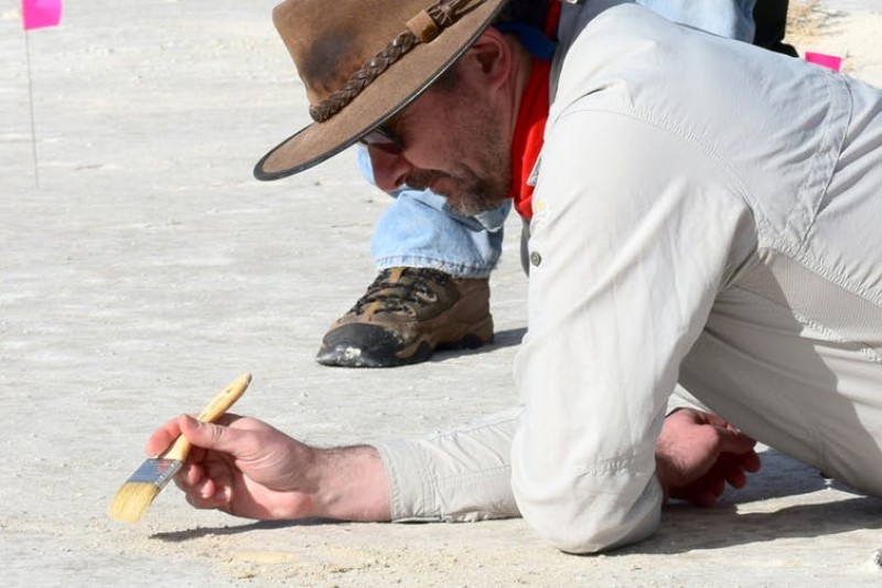 Matthew Bennett, dusting for prints.