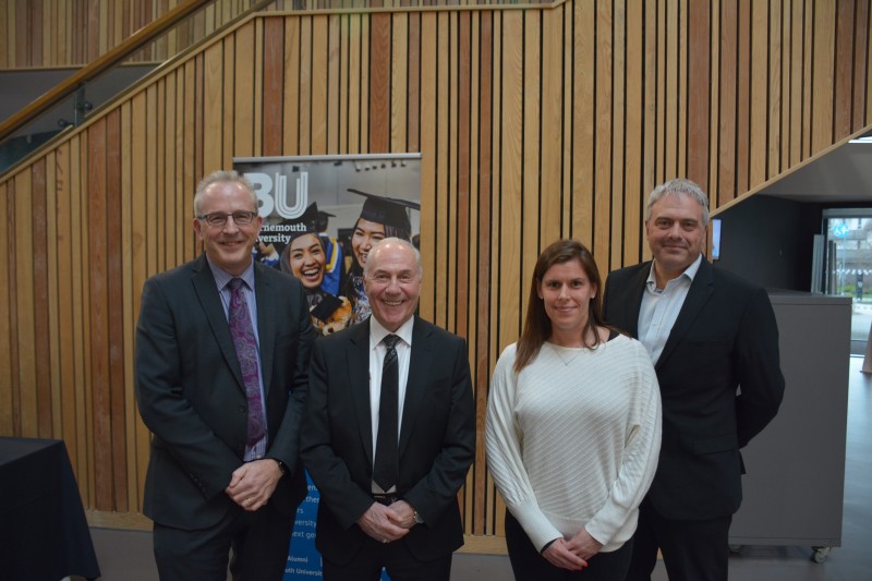 John Vinney, Jeff Mostyn, Helen Palmer and Jim Andrews standing in a row, looking at the camera