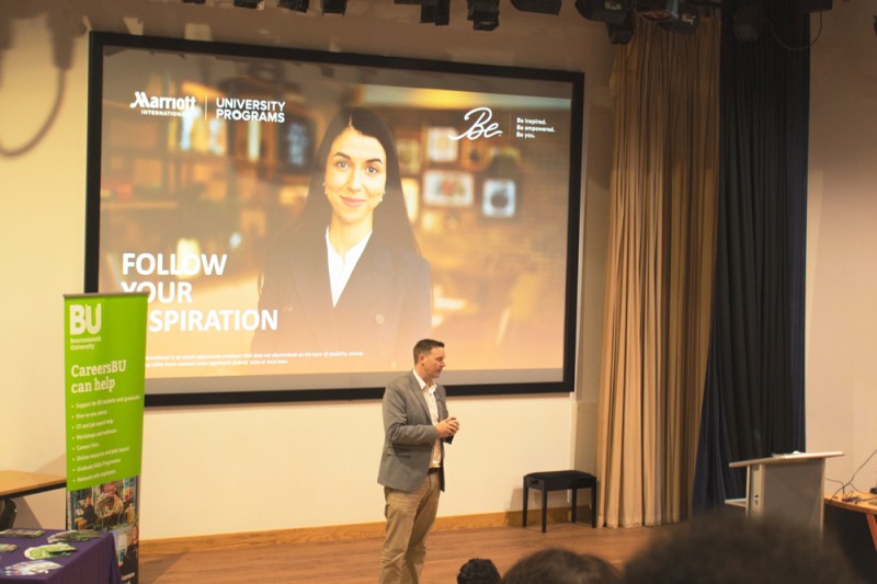 Mike Harrison on stage addressing students at the launch event Mike Harrison addressing students at the launch event