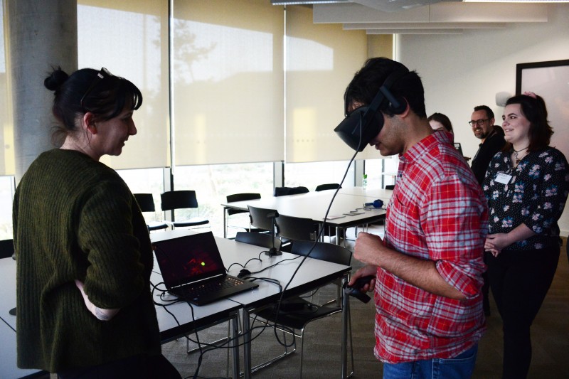 Students try the VR digital writing exhibition.