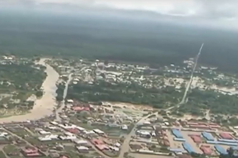 An aerial view of a city with extensive flooding